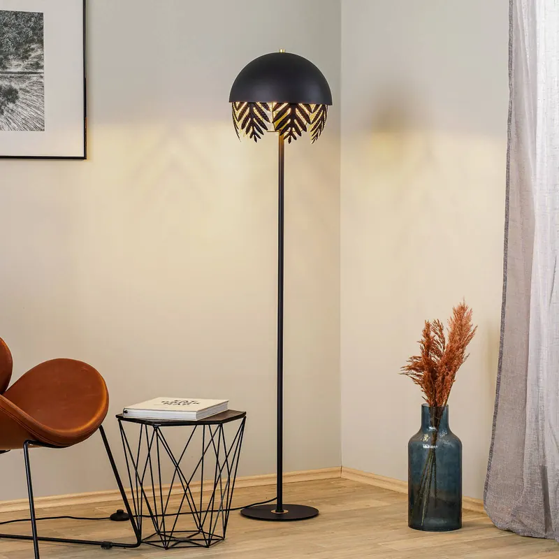 Lampa podłogowa Lucande Aparas o wyglądzie liścia, czarno-złota