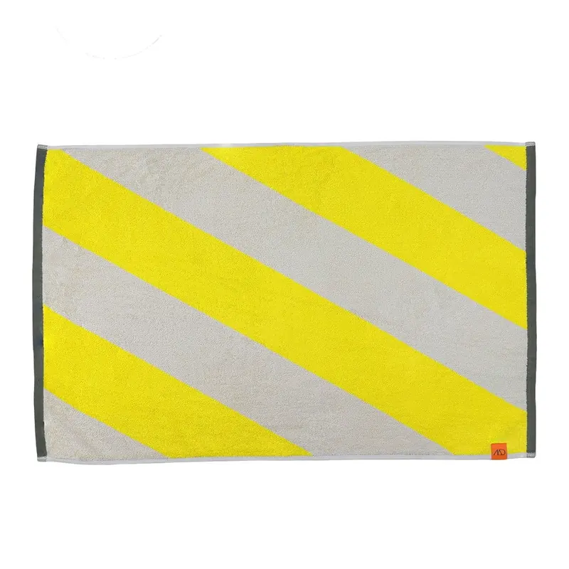 Żółty dywanik łazienkowy z bio bawełny 50x80 cm Diagonal – Mette Ditmer Denmark