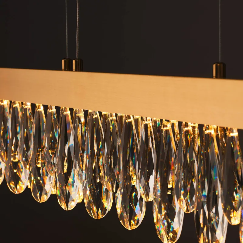 Żyrandol LED Celestia, długość 110 cm, kolor mosiężny, kryształ