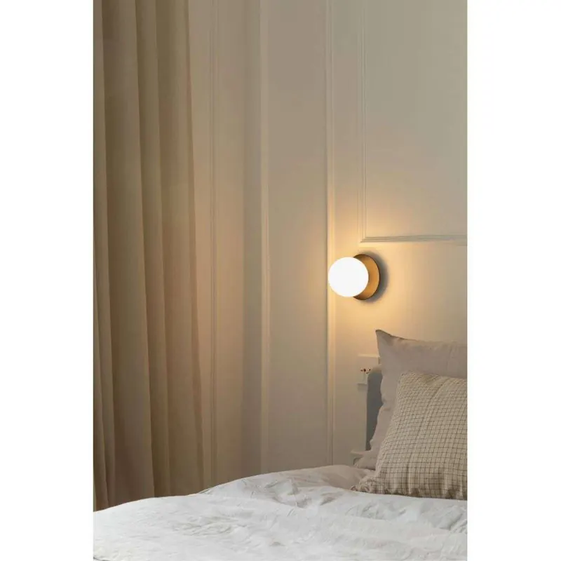 Kinkiet Nuura Liila 1, Ø 14 cm, IP44, czarny/opalowy