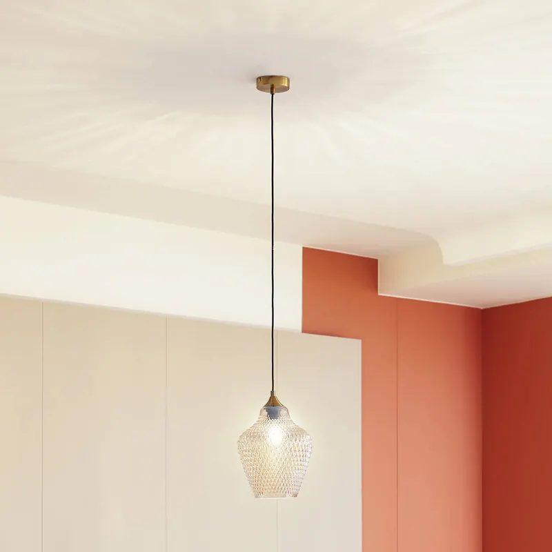 Lampa wisząca Lindby Drakar, 1-punktowa, bursztynowa, Ø 22 cm
