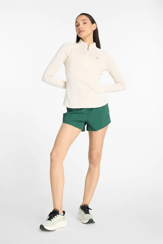 New Balance Rc Essential Heat Grid 1/2 Zip Linenhea Maat: M | Longsleeves Outlet | Dames | Ecru