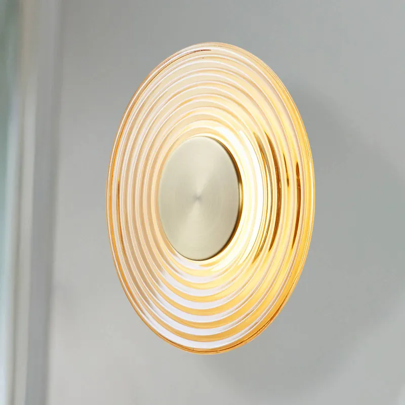 Kinkiet LED Cleo, kolor bursztynowy/mosiężny, Ø 30 cm, szkło