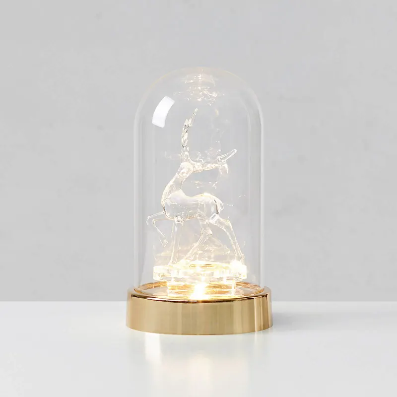 Oświetlenie dekoracyjne LED Isla, mosiądz/przezroczyste, renifer, wysokość 20 cm