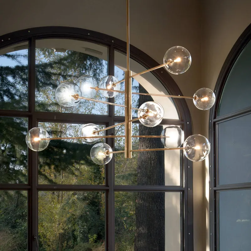 Żyrandol IDEAL LUX Equinoxe, mosiądz/bursztyn, 12-punktowy
