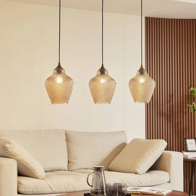 Lampa wisząca Lindby Drakar, Ø 22 cm, 3-punktowa, bursztyn, szkło