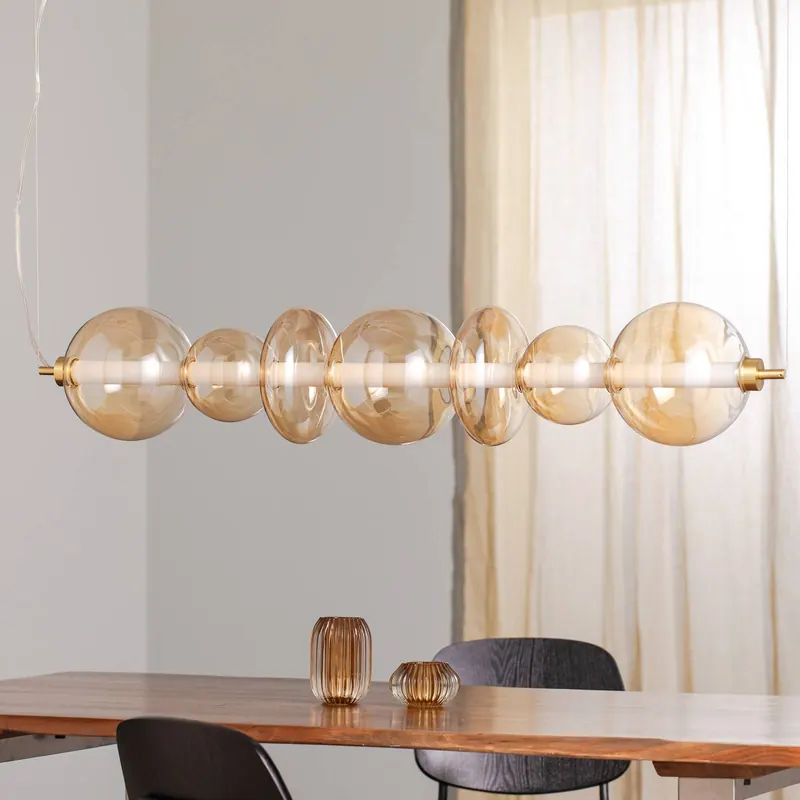 Żyrandol LED Daphne, szkło bursztynowo-przezroczyste, długość 118 cm