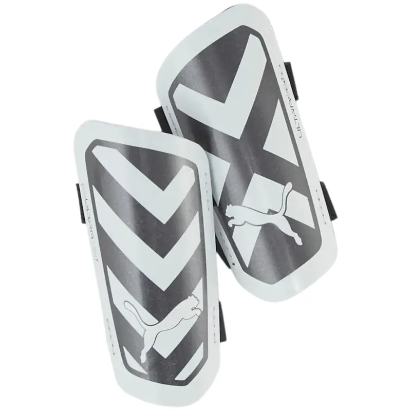 PUMA ochraniacze piłkarskie Ultra Light Strap 030875-03 białe/czarne (L)