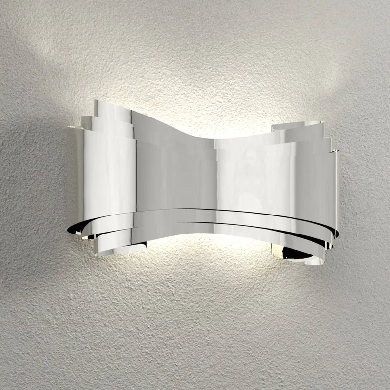 Designerska lampa ścienna Ionica, chrom