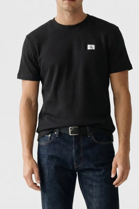 Calvin Klein Ss Waffle Badge Crewnetee Black Maat: L | Basic T-Shirts Outlet | Heren | Zwart