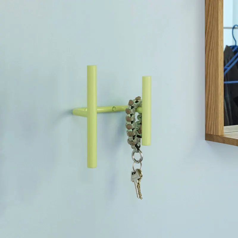 Wieszak ścienny Flip, jasnozielony, szerokość 20 cm, metalowy