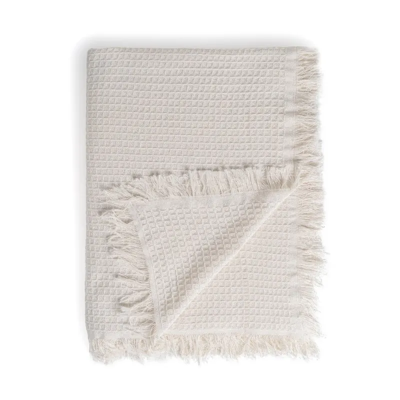 Kremowa narzuta z bawełny z recyklingu 260x280 cm Honeycomb – Ixia
