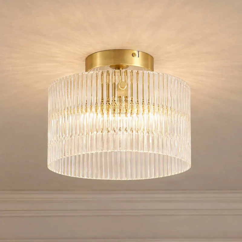 Lampa sufitowa Lucande Meritt, mosiądz/przezroczysta, Ø 25 cm, szkło