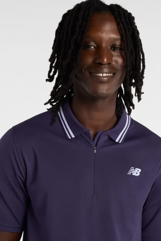New Balance Tournament Polo Boysenbe Maat: M | Sport Shirts Outlet | Heren | Paars