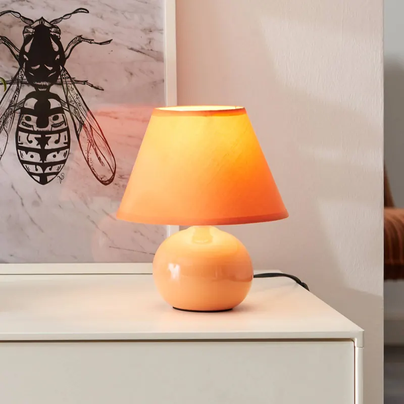Lampa stołowa Primo, pomarańczowa, Ø 19 cm, tekstylna/ceramiczna