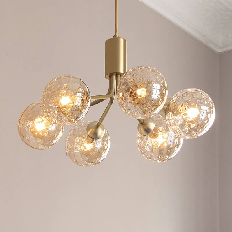 Lampa wisząca Nuura Apiales 6, Ø 50 cm, kolor mosiężny/złoty